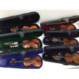 Ten student model violins