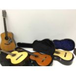 Four acoustic guitars