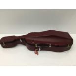 Cello case, with cherry red finish, internal measurement approximately 132cm