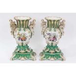 Pair of 19th century French porcelain vases, of baluster form with scrollwork handles and base, pain