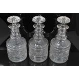 Trio cut glass decanters
