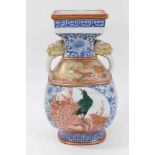 Antique Japanese Meiji period porcelain vase, painted in the Satsuma style with panels containing pe