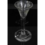 Georgian wine glass, c.1750, the drawn trumpet bowl with Jacobite engraving and inscribed 'FIAT', on