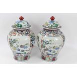 Pair of Chinese Famille verte baluster vases and covers, each with six character Jiajing mark