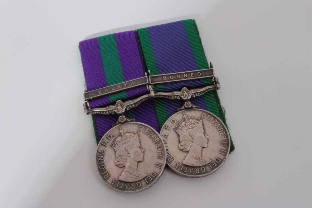 Elizabeth II medal pair comprising Pre 1962 type General Service medal with one clasp- Malaya, named