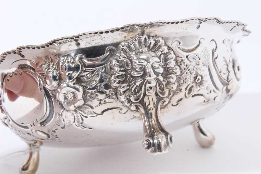 Victorian silver sugar bowl of circular form with foliate embossed borders, on three scroll feet ( L - Image 2 of 5