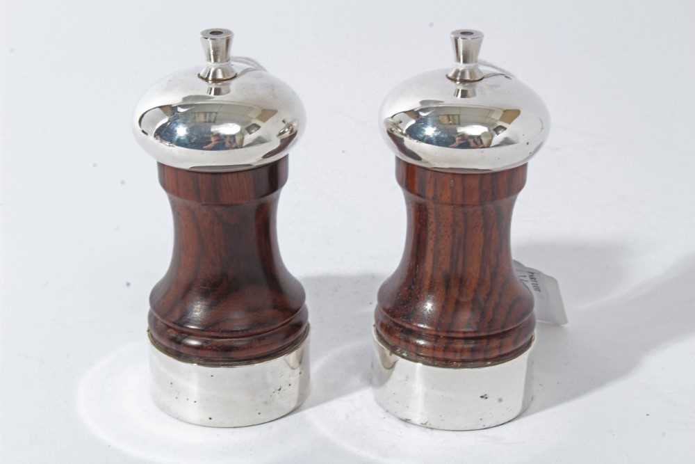 Pair of Contemporary silver mounted wooden salt and pepper mills of conventional form, (London 1992)