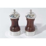 Pair of Contemporary silver mounted wooden salt and pepper mills of conventional form, (London 1992)
