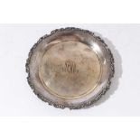 Late 19th century American silver card tray of circular form with floral and scroll border and centr