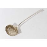 George III silver old english pattern serving ladle with feather edge, engraved crest and scalloped
