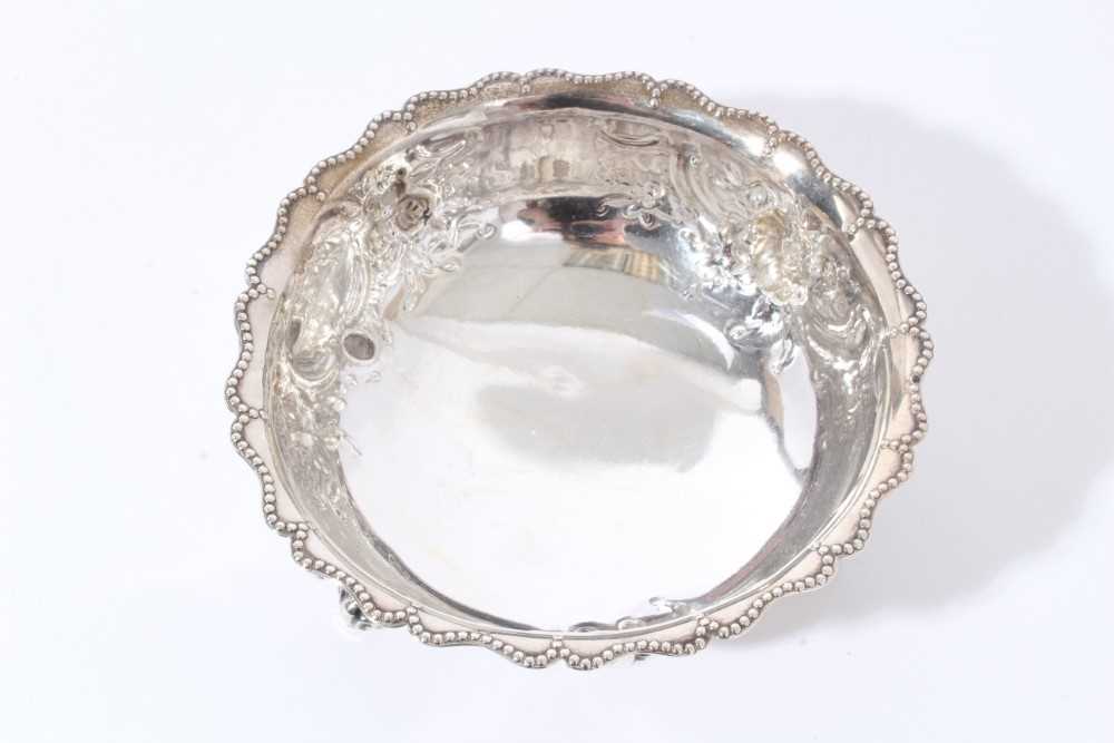 Victorian silver sugar bowl of circular form with foliate embossed borders, on three scroll feet ( L - Image 3 of 5