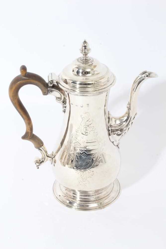 Good quality George III coffee pot of baluster form, with engraved armorial crest, hinged domed cove