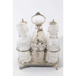 George III silver cruet frame of rectangular form with reeded decoration and central handle, on four