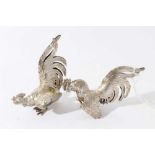 Pair of silver models of fighting birds, London import hallmarks 1978, by Israel Freeman & Son Ltd