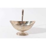 Gerorge III silver dish of navette form with brite cut engraved decoration, with reeded swing handle