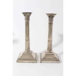 Pair of Victorian silver Corinthian column candlesticks with fluted columns, candle holders with aca