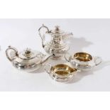 George IV silver four piece teaset, comprising teapot of squat form with central band of reeded deco