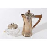 George V silver hot water pot of tapered cylindrical form, domed hinged cover with turned wood finia