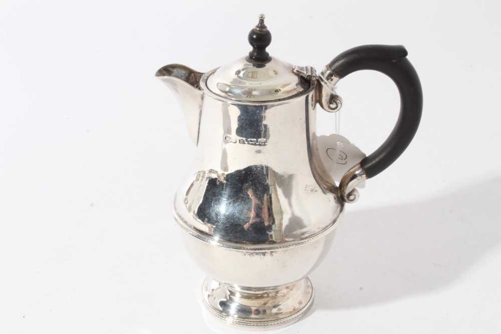 George V silver hot water pot of baluster form with ebony finial and loop handle (Birmingham 1931), - Image 2 of 5