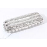 Victorian silver cigar case of rectangular form with shaped corners, engraved foliate decoration, si