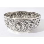 Good quality late 19th century Chinese Export silver bowl with embossed decoration depicting Dragons