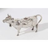 Late 19th white metal cow creamer, naturalistically modelled, the horned cow with open mouth, textur