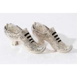 Pair of late Victorian Continental silver Pot Pouri holders in the form of shoes with embossed decor