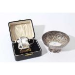 Edwardian Art Nouveau silver bowl of circular form with embossed floral decoration, on pedestal foot