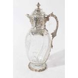 Victorian silver mounted clear glass claret jug with "rock crystal" decoration