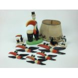 Five Carlton Ware Guinness toucan wall plaques, lamp (broken) and three ‘My Goodness’ figures