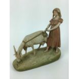Royal Dux porcelain model of a girl with a goat, pink triangle mark to base, 29cm wide, 30cm high