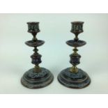 Pair of Doulton Lambeth candlesticks, impressed marks to base, 20.5cm high