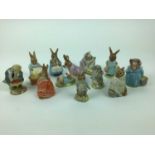 Eleven Beswick Beatrix Potter figures - Tommy Brock, Tabitha Twitchet and Miss Moppet, Mrs Flopsy Bu