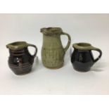 Three Phil Rogers salt glazed studio pottery jugs, 18cm, 13.5cm and 12cm high (smaller two have mono