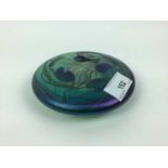 John Ditchfield Glasform iridescent lily pad paperweight with silver dragonfly, signed, 13cm diamete