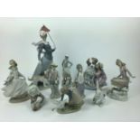 Collection of 20 Lladro and Nao porcelain figures