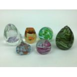 Six Caithness paperweights by Helen Macdonald, Gordon Henry and design studio