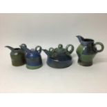 Three Jane Hamlyn salt glazed studio pottery jugs, 17cm, 15cm and 13cm high plus a Jane Hamlyn teapo