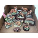 Ten Border Fine Arts sculptures of foxes including Family Portrait, Summer Fun and Sitting Fox