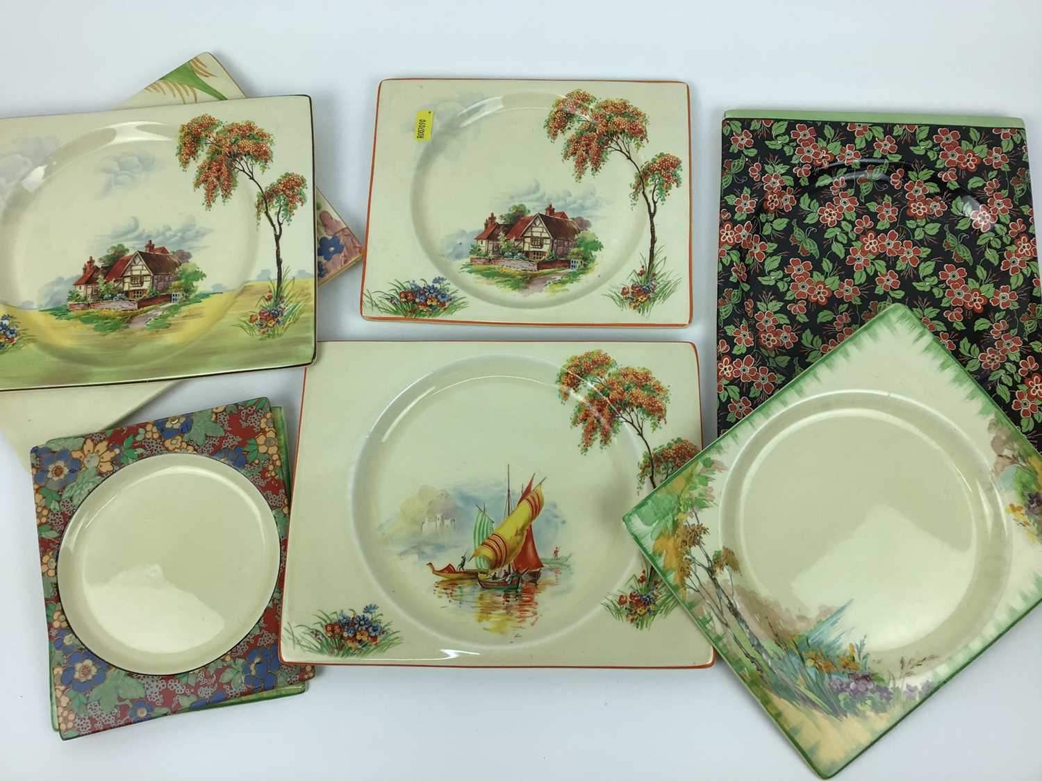 Collection of Clarice Cliff Royal Staffordshire The Biarritz rectangular plates, decorated in variou