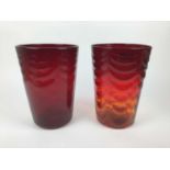 Two large Whitefriars Ruby red waved ribbed vases, 29cm high