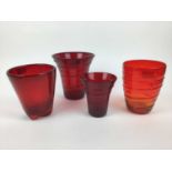 Three Whitefriars Ruby red ribbon trailed vases, 19cm, 18cm and 14cm