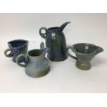 Four Jane Hamlyn studio pottery salt glazed jugs, smallest 9.5cm high, tallest 19cm high