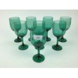 Set of eight green glass wines