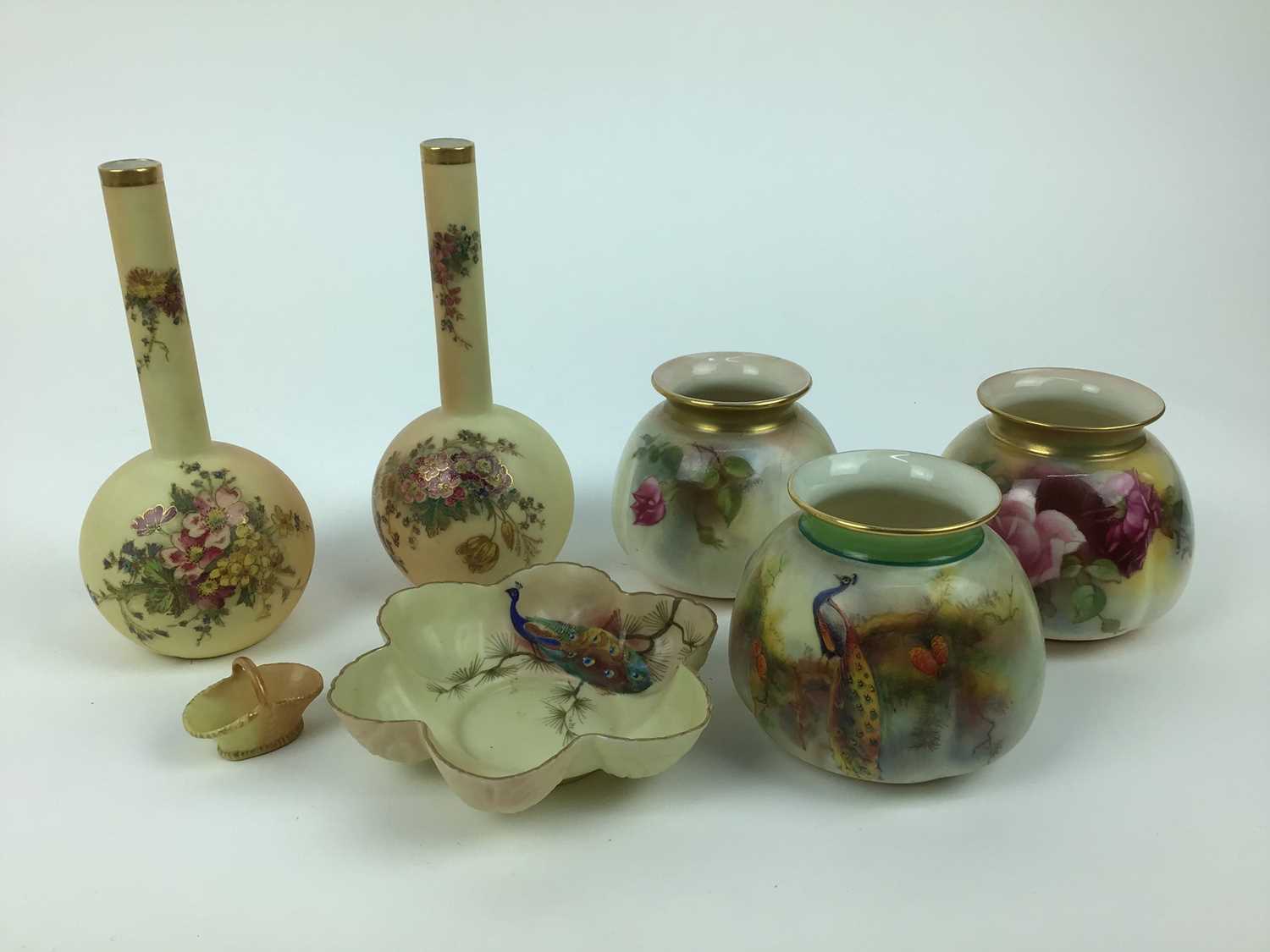 Selection of Royal Worcester including pair of slender neck bottle vases, miniature basket etc, 7 pi