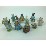 Eleven Beswick Beatrix Potter figures - Ribby, Mr Jackson, Tom Kitten, Little Pig Robinson, Mr Benja