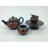 Group of Moorcroft pomegranate pewter mounted tablewares - teapot, milk jug, Tarza, rosebowl