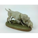 Royal Dux porcelain model of two dogs, pink triangle mark to base, 29cm wide, 18cm high