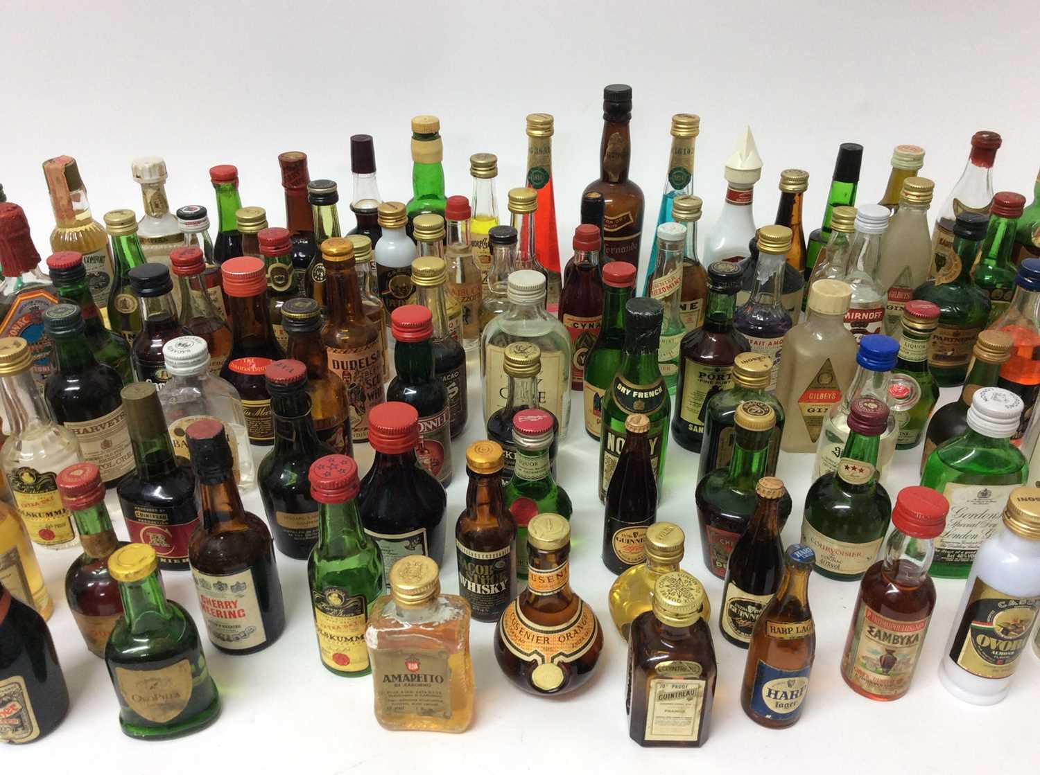 Collection of one hundred and five alcoholic miniatures to include, liqueurs, gin, vodka and others