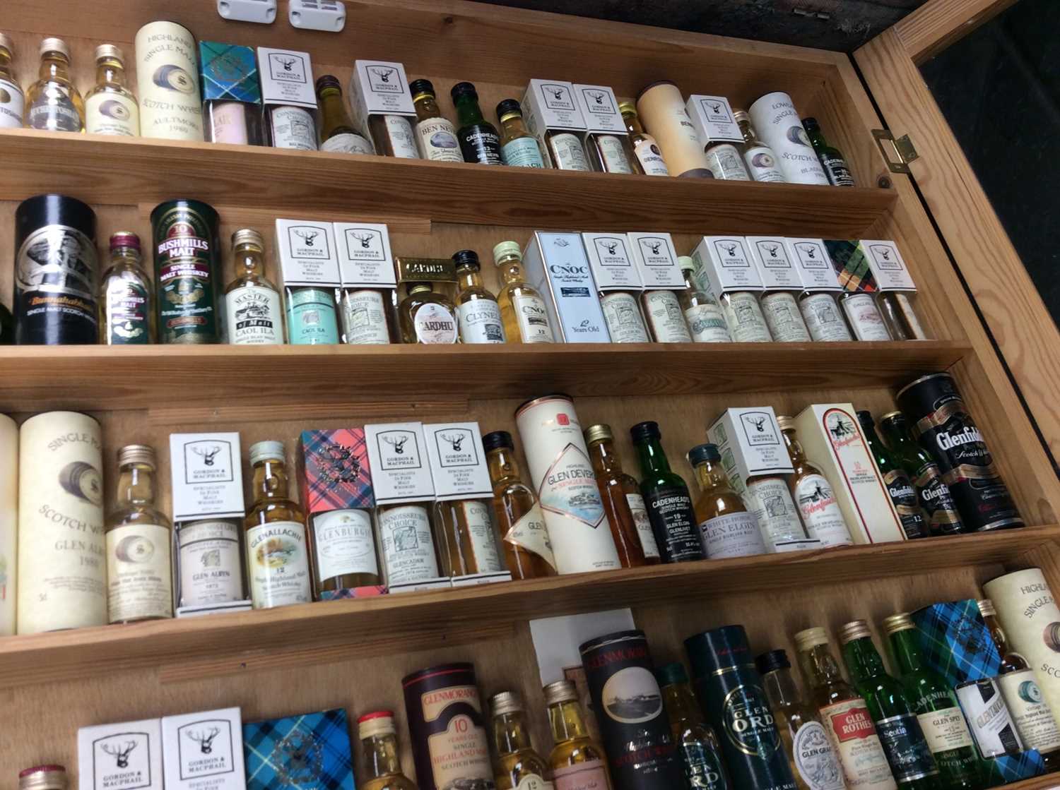 Fine collection of Scottish single malt whiskies in display cabinet, believed to represent all but t - Image 4 of 9